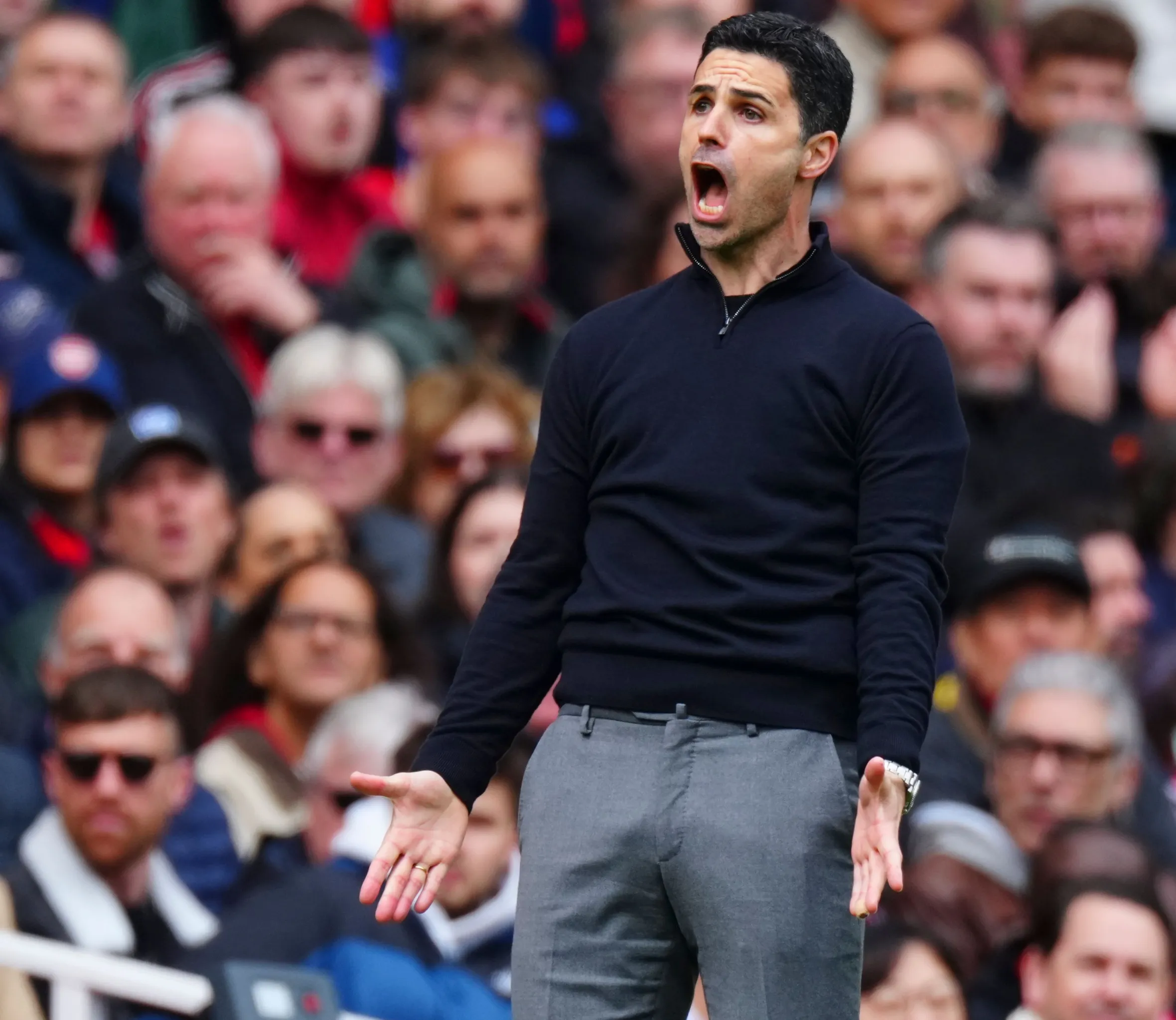 Arsenal Manager Mikel Arteta reacts during a football match.
