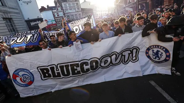 Chelsea fans protest their owner Blue-Co ahead of the Premier League match between Chelsea and Manchester United