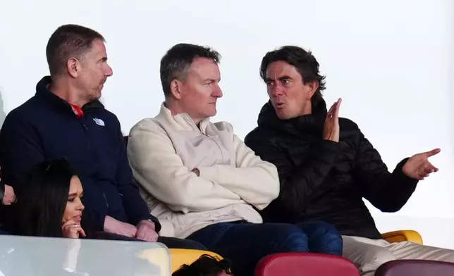 Former Brentford and Tottenham manger Thomas Frank in the stands during the English Premier League soccer match between Brentford and Fulham in Brentford, England, Saturday, April 18, 2026. (John Walton/PA via AP)