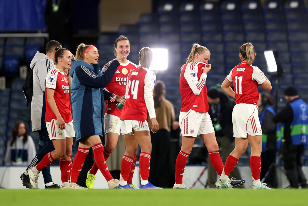 LONDON, ENGLAND - APRIL 01: Chloe Kelly of Arsenal speaks to team mates Lotte Wubben-Moy and Taylor Hinds (obscured) after winning 2-3 on aggregate following a 1-0 defeat in the UEFA Women's Champions League 2025/26 Quarter-finals Second Leg match between Chelsea and Arsenal at Stamford Bridge on April 01, 2026 in London, England. (Photo by Warren Little/Getty Images)