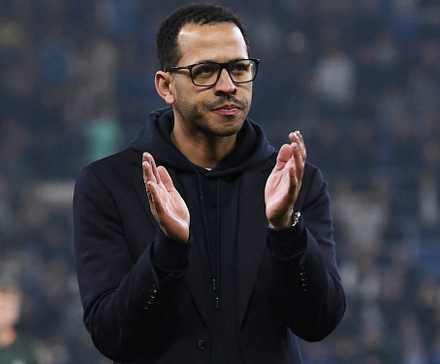 Chelsea manager Liam Rosenior applauds fans after the match