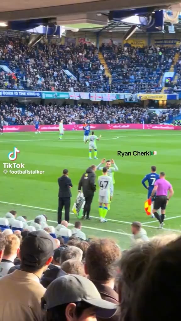 Rosenoir shaking Cherki’s hand when subbed