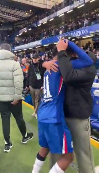 Reece James hugging Estevao at Full Time