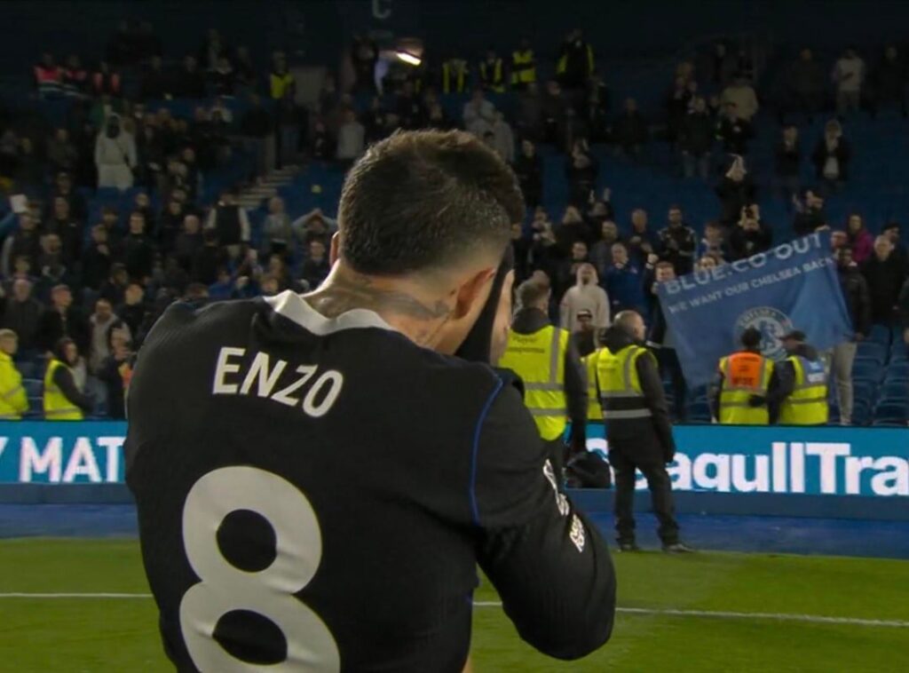 Enzo is the last Chelsea player off the pitch after a disappointing performance. Enzo is just staring at the away end whilst doing up his captains arm band.