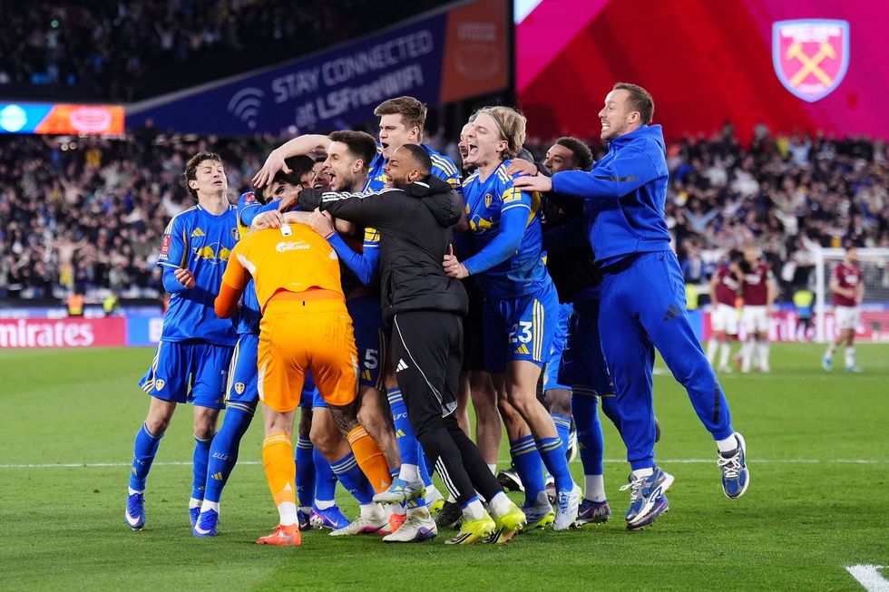 Leeds players celebrate their sensational win over West Ham at the London Stadium