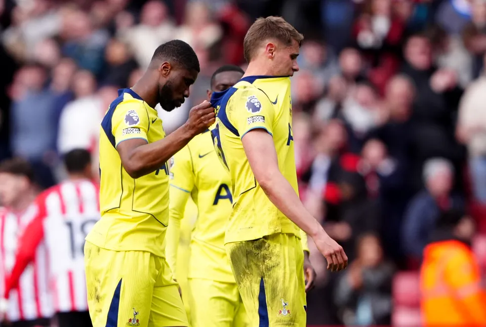 Kevin Danso (left) and Micky van de Ven leave the pitch after the Premier League match at the Stadium of Light