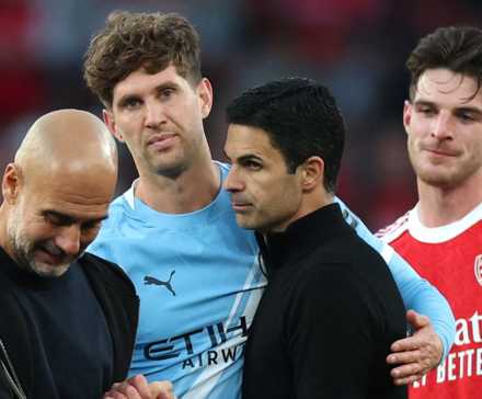 Arsenal manager Mikel Arteta and Declan Rice with Manchester City manager Pep Guardiola and John Stones