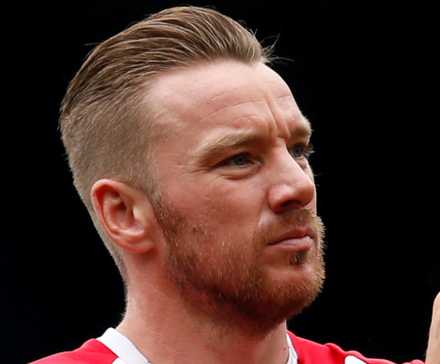 Jamie O'Hara applauds fans at Bradley Lowery Benefit Match