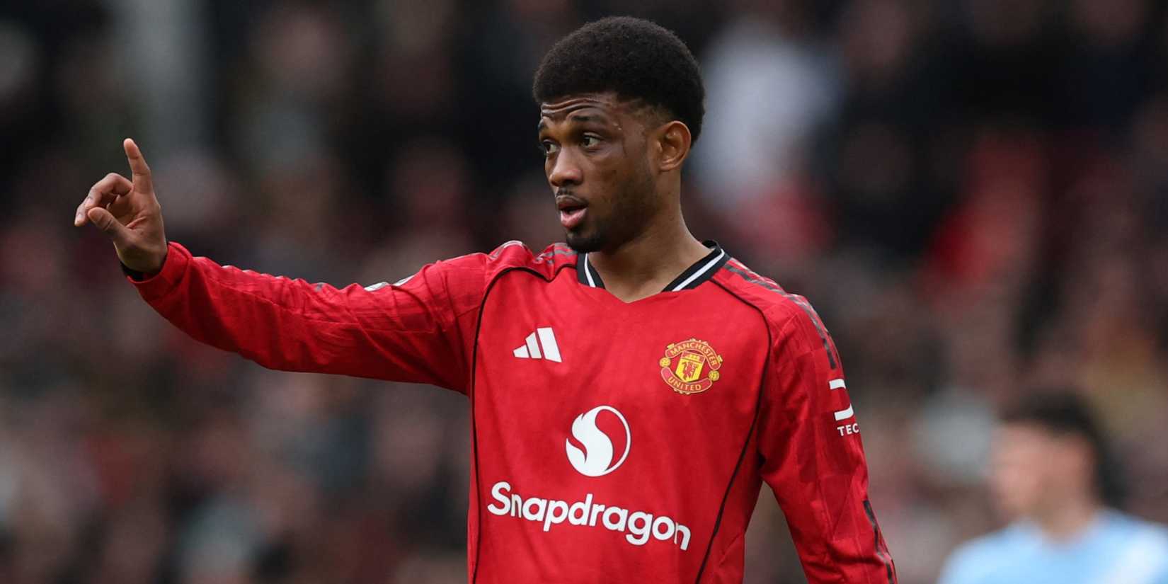 Manchester United's Amad Diallo reacts against Man City