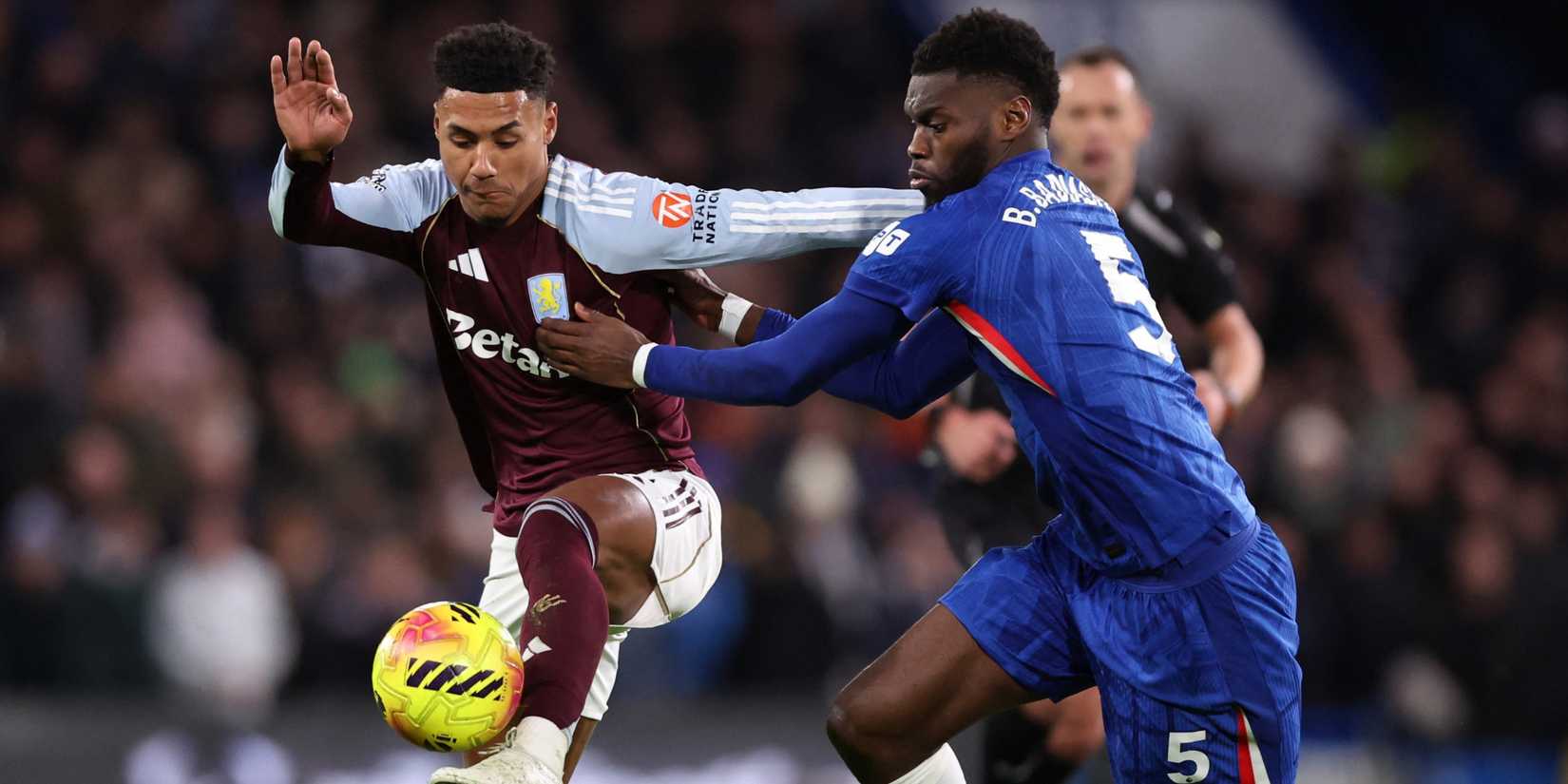 Aston Villa's Ollie Watkins in action with Chelsea's Benoit Badiashile