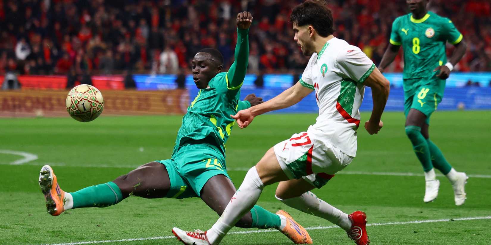 Morocco's Abde Ezzalzouli in action with Senegal's Antoine Mendy