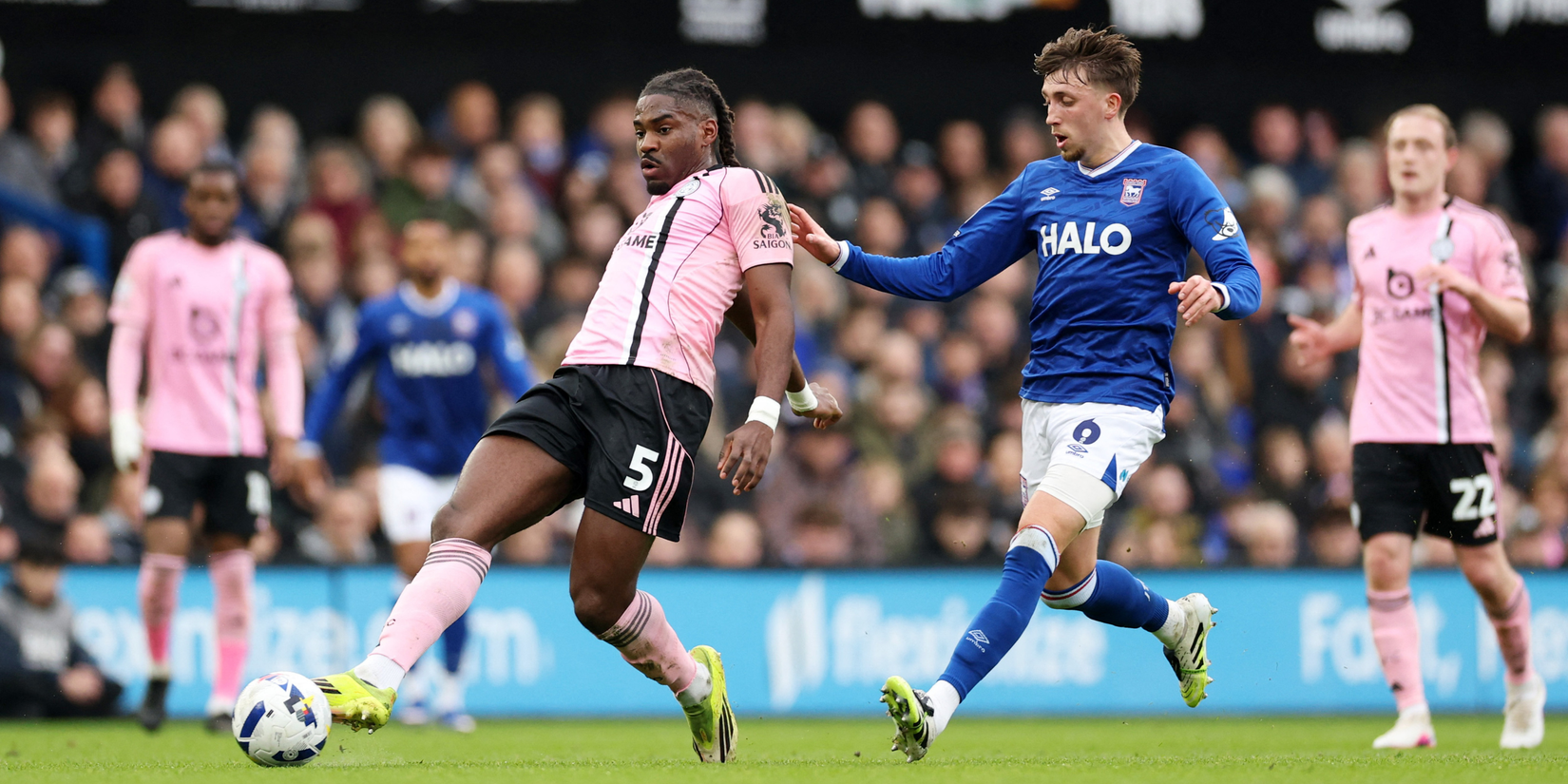 Leicester City's Caleb Okoli and Ipswich Town midfielder Dan Neil