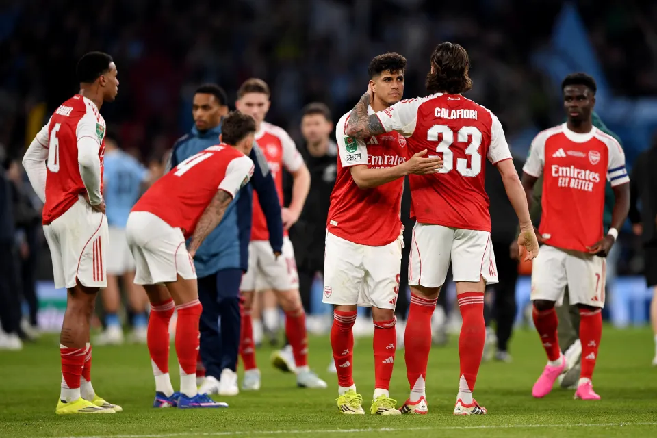 Arsenal players react after losing Carabao Cup final