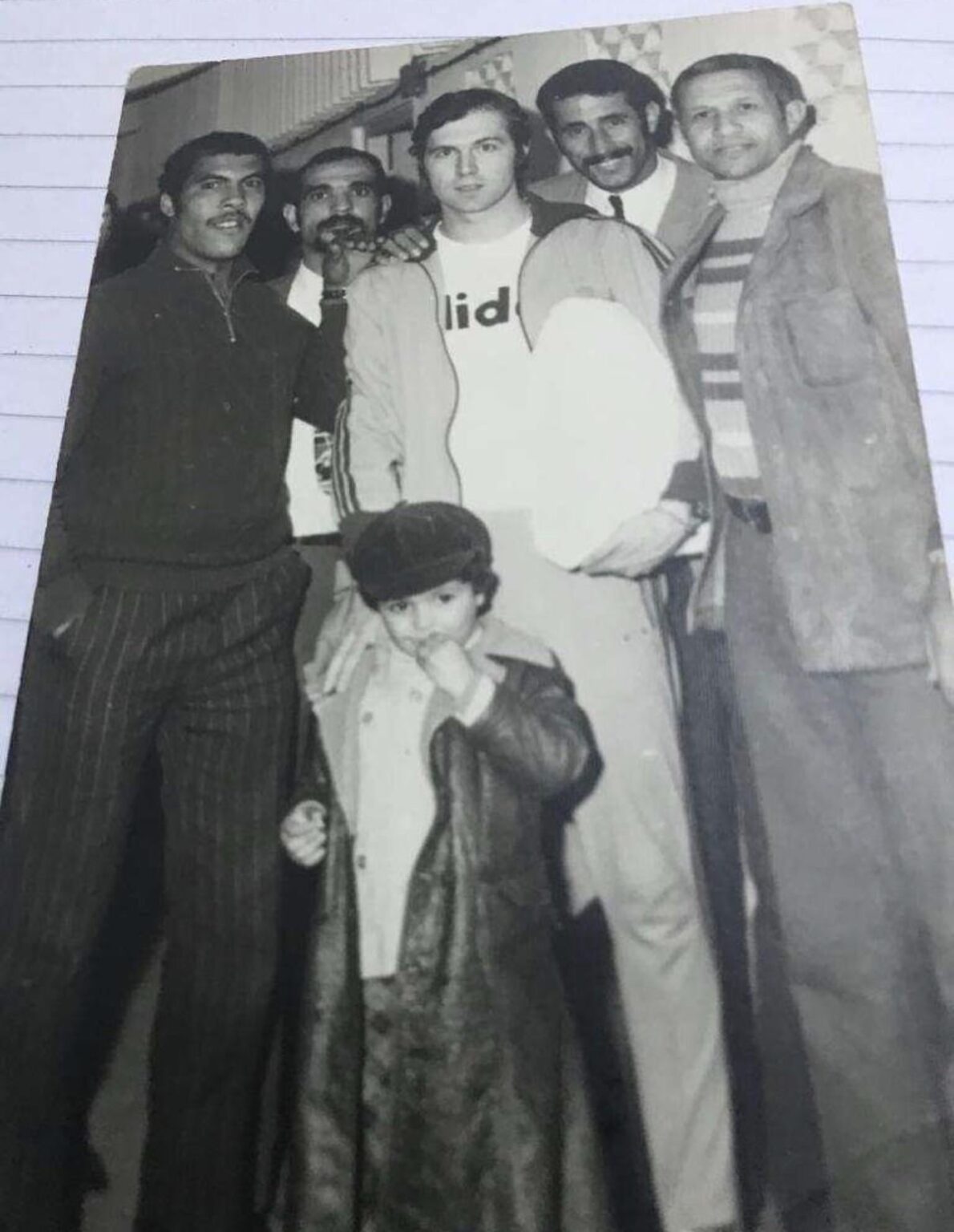 Found an old photo with my dad as a kid meeting Franz Beckenbauer
