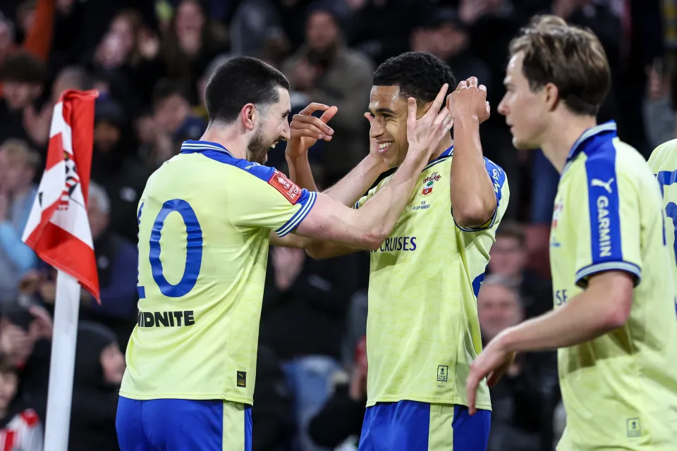 Shea Charles of Southampton celebrates after he scores a goal to make it 2-1 with team-mate Finn Azaz during the Emirates FA Cup Quarter Final match between Southampton and Arsenal