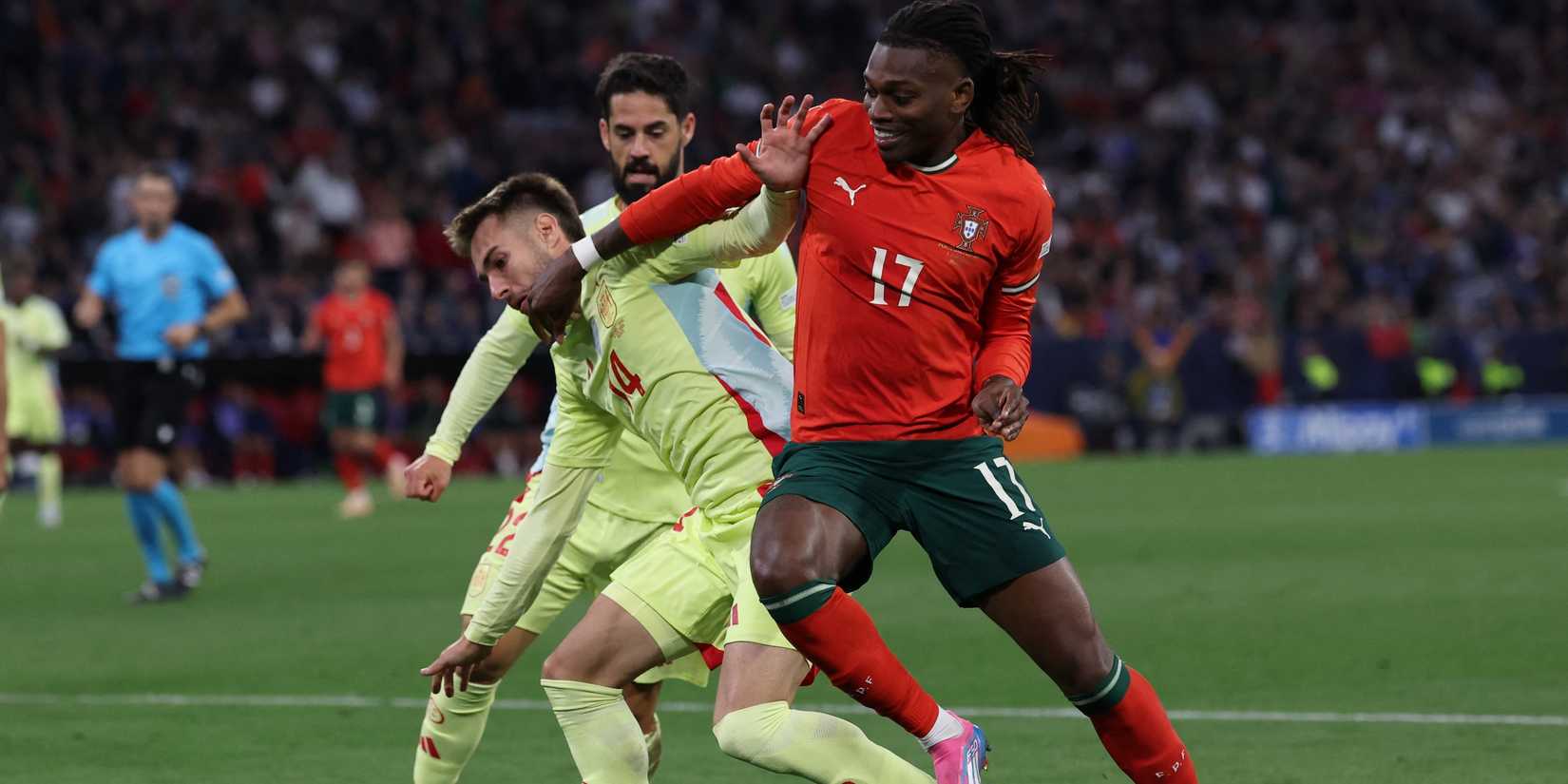 Spain's Oscar Mingueza in action with Portugal's Rafael Leao