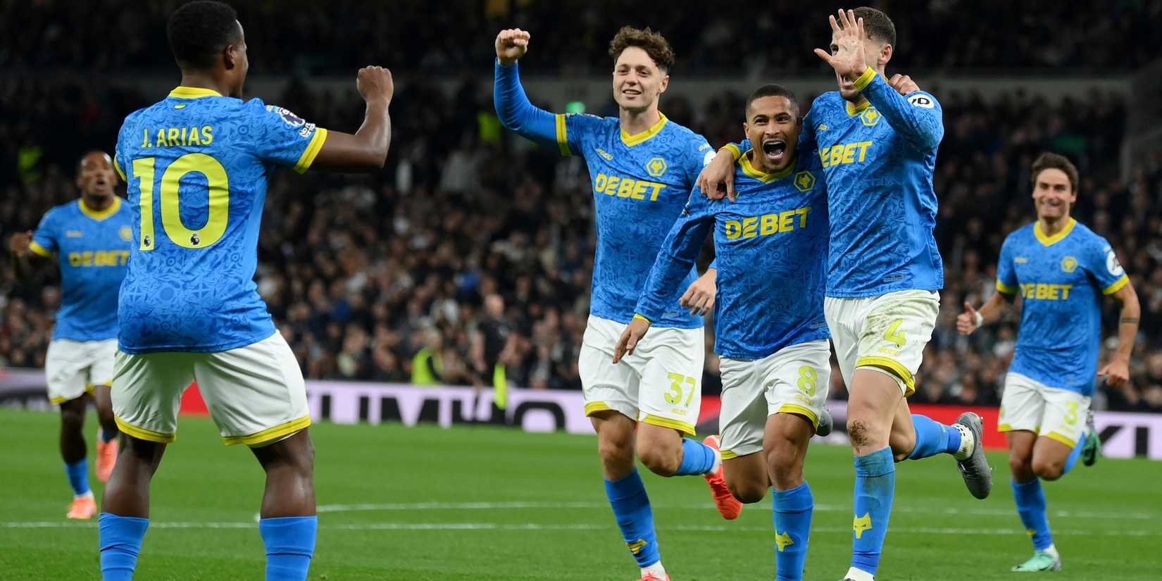 Wolverhampton Wanderers' Santiago Bueno celebrates scoring their first goal with Joao Gomes, Jhon Arias and Ladislav Krejci