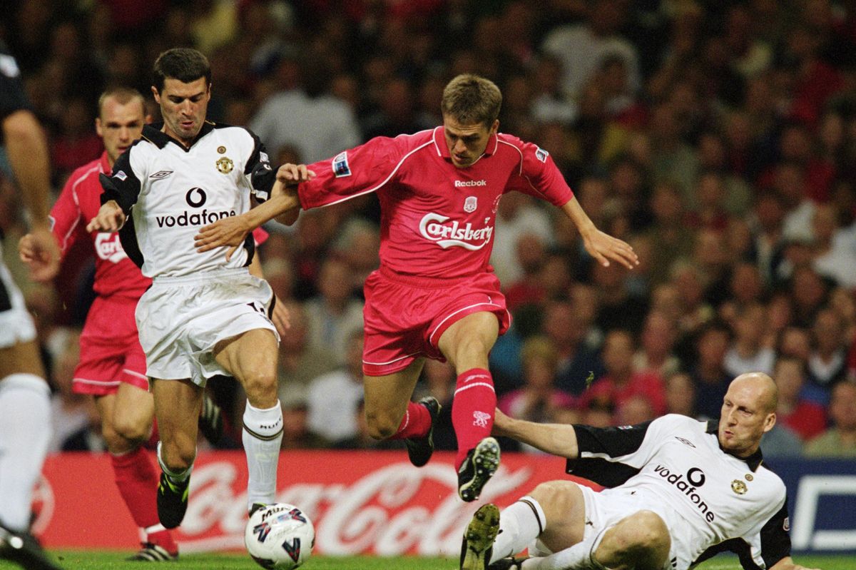Michael Owen playing for Liverpool against Manchester United