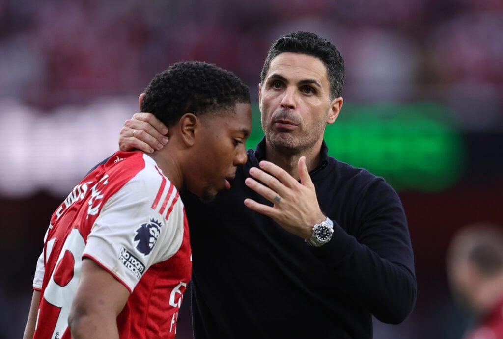 Mikel Arteta embraces Myles Lewis-Skelly after an Arsenal game