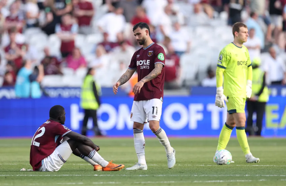 El Hadji Malick Diouf, Taty Castellanos and Mads Hermansen of West Ham United look dejected after the Premier League match between West Ham United and Leeds United