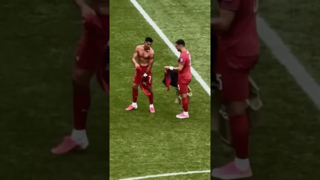 Diogo Dalot and Cristiano Ronaldo swap jersey after  the end of the match against Uzbekistan.