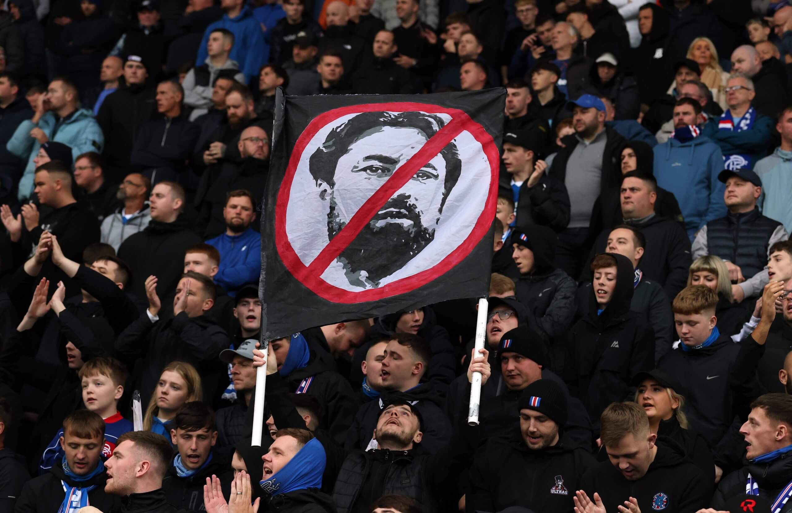 Rangers fans hold up anti-Russell Martin banners