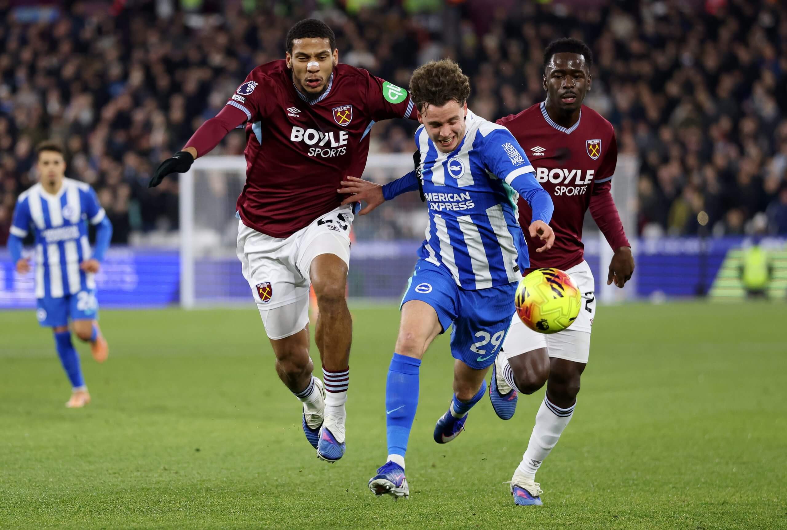 Maxim De Cuyper outpaces West Ham's Jean-Clair Todibo and Soungoutou Magassa