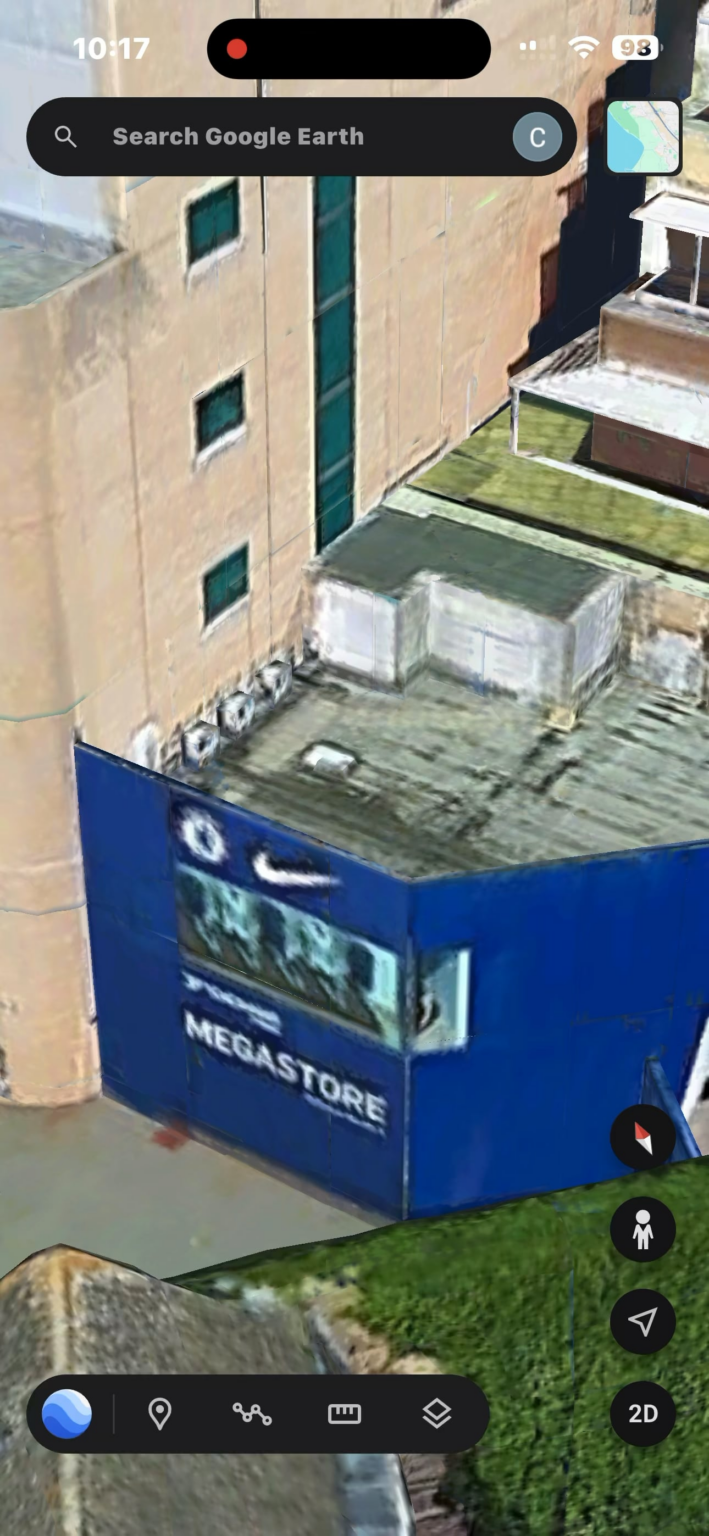 Google Earth shows that Stamford Bridge has a Nike Swoosh on the exterior of the stadium and interior having the name of Adidas