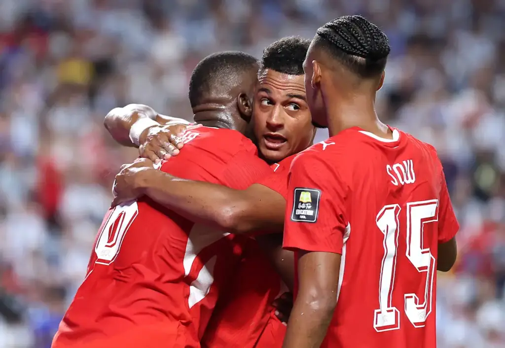 Dan Ndoye celebrates with his Switzerland team-mates