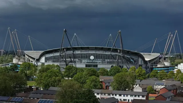 Rain clouds hover over The Etihad Stadium
