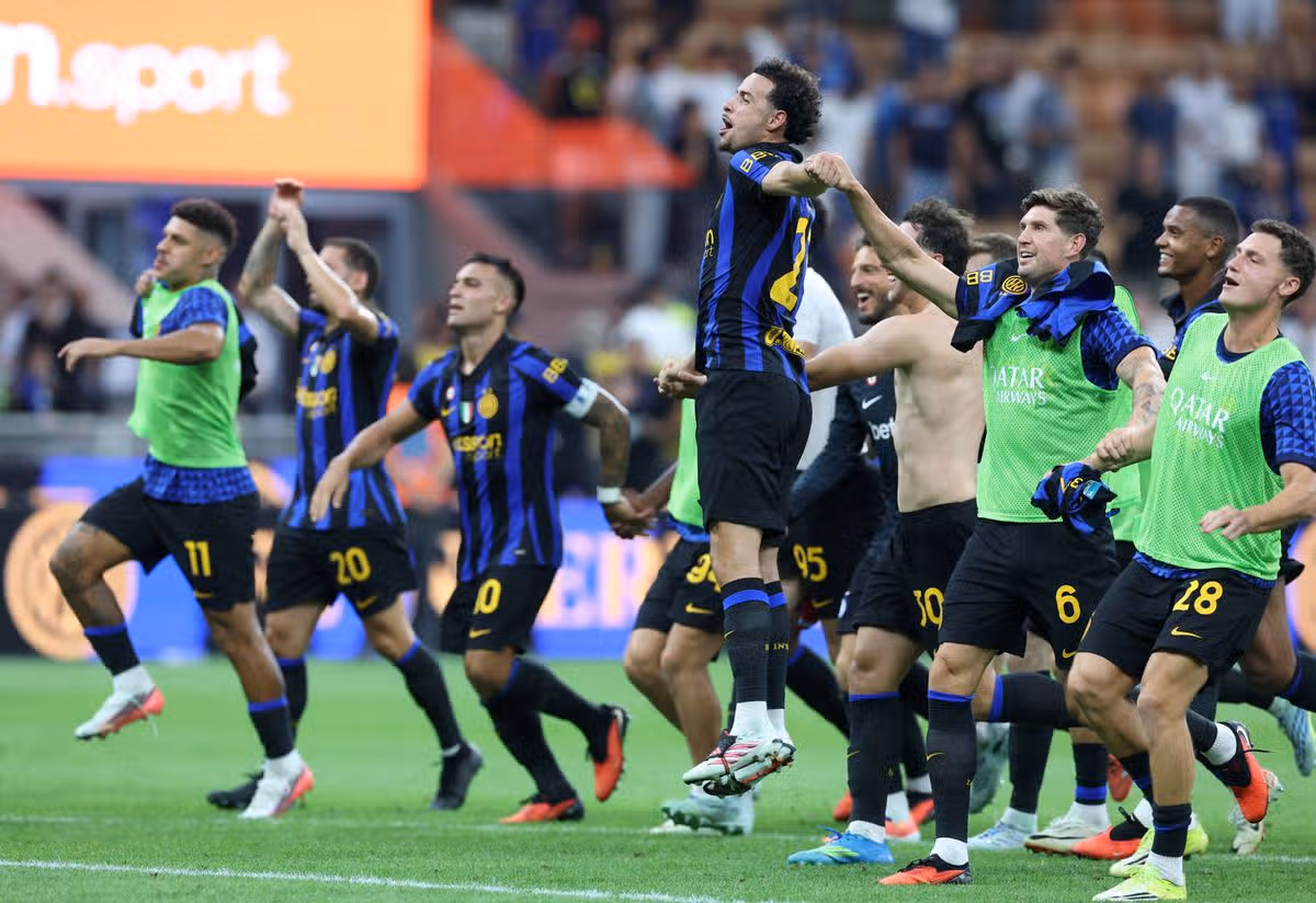 Curtis Jones and Inter players celebrate
