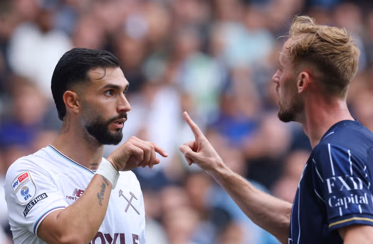 LONDON, ENGLAND - SEPTEMBER 19: Valentin Castellanos of West Ham United reacts with Mark Sykes of Millwall during the Sky Bet Championship 2026/27 match between Millwall and West Ham United at The Den on September 19, 2026 in London, England. (Photo by Richard Pelham/Getty Images)