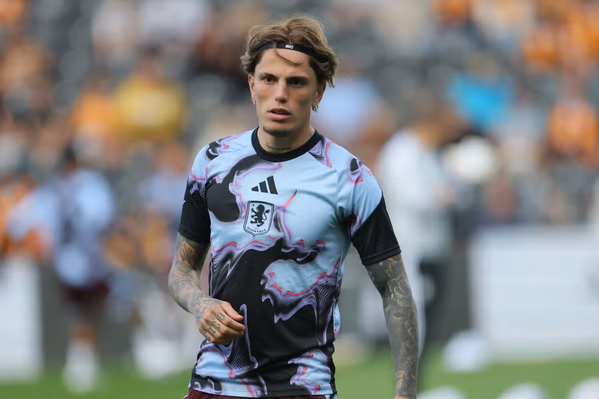 Aston Villa's Alejandro Garnacho warming up before the Premier League match at the MKM Stadium, Hull.